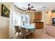 Charming kitchen with a gas cooktop, cozy breakfast nook, and ample natural light at 3459 Ridge Meadow St, Las Vegas, NV 89135