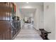 Entryway featuring hardwood flooring, accent furniture, and an open view of the main living space at 4050 Peaceful Dune St, Las Vegas, NV 89129