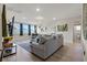 Spacious living room with hardwood floors and ample natural light at 4050 Peaceful Dune St, Las Vegas, NV 89129
