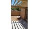 Covered patio area with brick and concrete flooring at 4304 Gretna Green Ct, Las Vegas, NV 89110