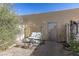 A backyard featuring a porch swing and gravel landscaping at 431 Las Casitas Way, Las Vegas, NV 89121