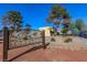 Las Casitas Townhomes community sign with landscaping at 431 Las Casitas Way, Las Vegas, NV 89121