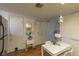 An eat-in kitchen offers a table, chairs, and an adjacent storage area at 431 Las Casitas Way, Las Vegas, NV 89121