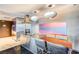 Sleek, modern kitchen featuring stainless steel appliances, a dining area, and stylish pendant lighting at 4381 W Flamingo # 2201, Las Vegas, NV 89103
