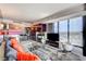Stylish living room featuring modern furniture, a fireplace, and stunning city views through large windows at 4381 W Flamingo # 2201, Las Vegas, NV 89103