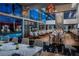 Dining room with stylish lighting, floor-to-ceiling windows, and a pool view at 4381 W Flamingo # 2201, Las Vegas, NV 89103