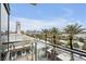 Scenic cityscape with palm trees and towering buildings from a high-rise balcony at 4381 West Flamingo Rd # 8322, Las Vegas, NV 89103