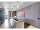 Modern kitchen boasting stainless steel countertops, sleek cabinetry, and stylish pendant lighting at 4381 West Flamingo Rd # 8322, Las Vegas, NV 89103