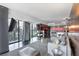 Modern living room with sleek floors, city views, and contemporary furnishings at 4381 West Flamingo Rd # 8322, Las Vegas, NV 89103