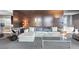 Stylish living room showcasing a comfortable sectional sofa and contemporary glass coffee table at 4381 West Flamingo Rd # 8322, Las Vegas, NV 89103