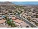 Expansive aerial view of a beautiful community with well-maintained homes and a stunning mountain backdrop at 441 Beautiful Hill Ct, Las Vegas, NV 89138