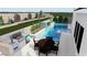 Custom backyard with pool, spa, outdoor kitchen, fireplace, and lush landscaping at 441 Beautiful Hill Ct, Las Vegas, NV 89138