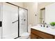Modern bathroom with a glass-enclosed shower and stylish vanity at 441 Beautiful Hill Ct, Las Vegas, NV 89138