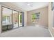 Bright bedroom featuring a sliding glass door with backyard views at 441 Beautiful Hill Ct, Las Vegas, NV 89138