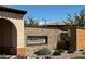 Neighborhood sign for Belmonte within a brick wall entrance with lush landscaping at 441 Beautiful Hill Ct, Las Vegas, NV 89138
