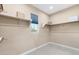 Walk-in closet with shelves and window to allow natural light at 441 Beautiful Hill Ct, Las Vegas, NV 89138
