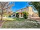 Large backyard with pool, mature landscaping, and a spacious lawn at 5148 Villa Vecchio Ct, Las Vegas, NV 89141