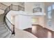 Grand foyer showcasing a curved staircase, high ceilings, and elegant chandelier at 5148 Villa Vecchio Ct, Las Vegas, NV 89141