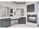 Close up of main bathroom vanity, fireplace and partial view of soaking tub at 5148 Villa Vecchio Ct, Las Vegas, NV 89141