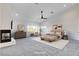 Spacious main bedroom with a fireplace, sitting area, and neutral tones at 5148 Villa Vecchio Ct, Las Vegas, NV 89141