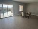 Bright dining area with tile floors and views of the backyard pool at 5371 Brevin Ct, Las Vegas, NV 89131