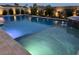 Sparkling pool with subtle underwater lighting and convenient entry steps, nestled in a private backyard oasis at 5371 Brevin Ct, Las Vegas, NV 89131