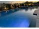 Backyard pool and spa with lounge area, perfect for outdoor entertaining in a beautifully landscaped setting at 5371 Brevin Ct, Las Vegas, NV 89131