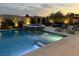 Inviting backyard pool and spa area with lounge chairs, fire pit, and outdoor seating, perfect for relaxation and entertaining at 5371 Brevin Ct, Las Vegas, NV 89131