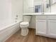 Clean bathroom with a tub, a vanity, and modern fixtures, providing a functional and comfortable space at 5383 Mountain Vista St # 20, Las Vegas, NV 89120