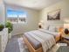 Serene bedroom featuring a comfortable bed, ample natural light, and stylish decor, providing a relaxing retreat at 5383 Mountain Vista St # 20, Las Vegas, NV 89120