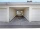 A carport with number 20 over the car opening, and cement floors at 5383 Mountain Vista St # 20, Las Vegas, NV 89120