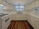 Well-equipped kitchen with white cabinetry, modern appliances, and ample counter space, perfect for cooking and meal preparation at 5383 Mountain Vista St # 20, Las Vegas, NV 89120