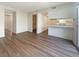 Open-concept living room showcasing sleek floors and seamless transition into the adjacent kitchen at 5383 Mountain Vista St # 20, Las Vegas, NV 89120