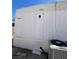 Exterior of home featuring vertical white siding at 5580 E Carey Ave, Las Vegas, NV 89156