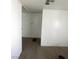 Hallway featuring white walls, and wood-look floors at 5580 E Carey Ave, Las Vegas, NV 89156
