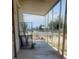 Covered porch and metal gate offering a shaded space to enjoy the outdoors at 5580 E Carey Ave, Las Vegas, NV 89156