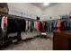 Walk-in closet features custom shelving, hanging racks and storage options at 6225 Gambetta St, Las Vegas, NV 89115