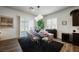 Dining room featuring modern lighting, comfortable seating and access to an outside patio at 6225 Gambetta St, Las Vegas, NV 89115