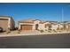 Inviting single-story home with a two-car garage, desert landscaping, and a classic tile roof at 6225 Gambetta St, Las Vegas, NV 89115