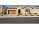 Charming single-story home showcasing a well-maintained lawn, a two car garage and tile roof at 6225 Gambetta St, Las Vegas, NV 89115