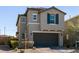 Charming two-story home with a well-maintained front yard and a two-car garage at 6308 Gulf Waters St, North Las Vegas, NV 89081