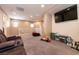 Carpeted upstairs loft featuring a television at 6308 Gulf Waters St, North Las Vegas, NV 89081