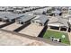 Aerial view highlighting backyard of modern home with potential for outdoor activities, in a residential neighborhood at 6726 N Palmer Estates St, North Las Vegas, NV 89086