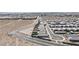 An aerial view of a new residential community, featuring modern homes and well-maintained streets at 6726 N Palmer Estates St, North Las Vegas, NV 89086