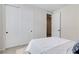 Bright bedroom with a bed, closet, and natural light at 6726 N Palmer Estates St, North Las Vegas, NV 89086