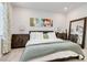 Bright bedroom featuring large windows, plush carpeting and a neutral palette at 6726 N Palmer Estates St, North Las Vegas, NV 89086