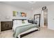 Bright bedroom featuring large windows, plush carpeting and a neutral palette at 6726 N Palmer Estates St, North Las Vegas, NV 89086