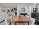 Open-concept dining area with table, chairs, and a view to the kitchen at 6726 N Palmer Estates St, North Las Vegas, NV 89086