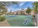 Community basketball court for residents, with a shaded seating area nearby at 6745 Caporetto Ln # 104, North Las Vegas, NV 89084