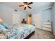 Spacious bedroom with carpet, large window, ceiling fan and ample closet space at 6745 Caporetto Ln # 104, North Las Vegas, NV 89084
